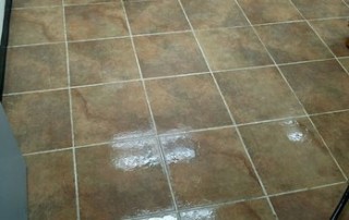 tile floor being scrubbed - Upholstery Cleaning concept image