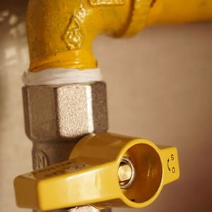 water valve in need of repair - emergency water damage restoration concept image