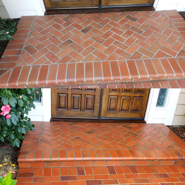 Restored and color enhanced exterior brick entryway landing after pressure cleaning